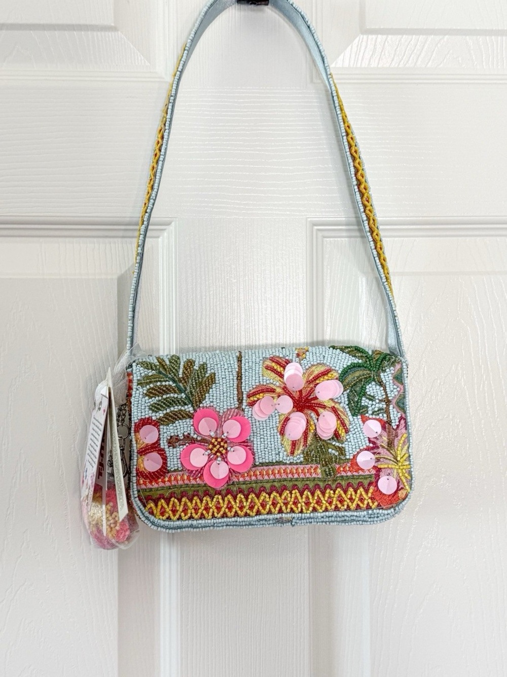 Beaded Floral Shoulder Bag in Light Blue with Pink hibiscus flowers